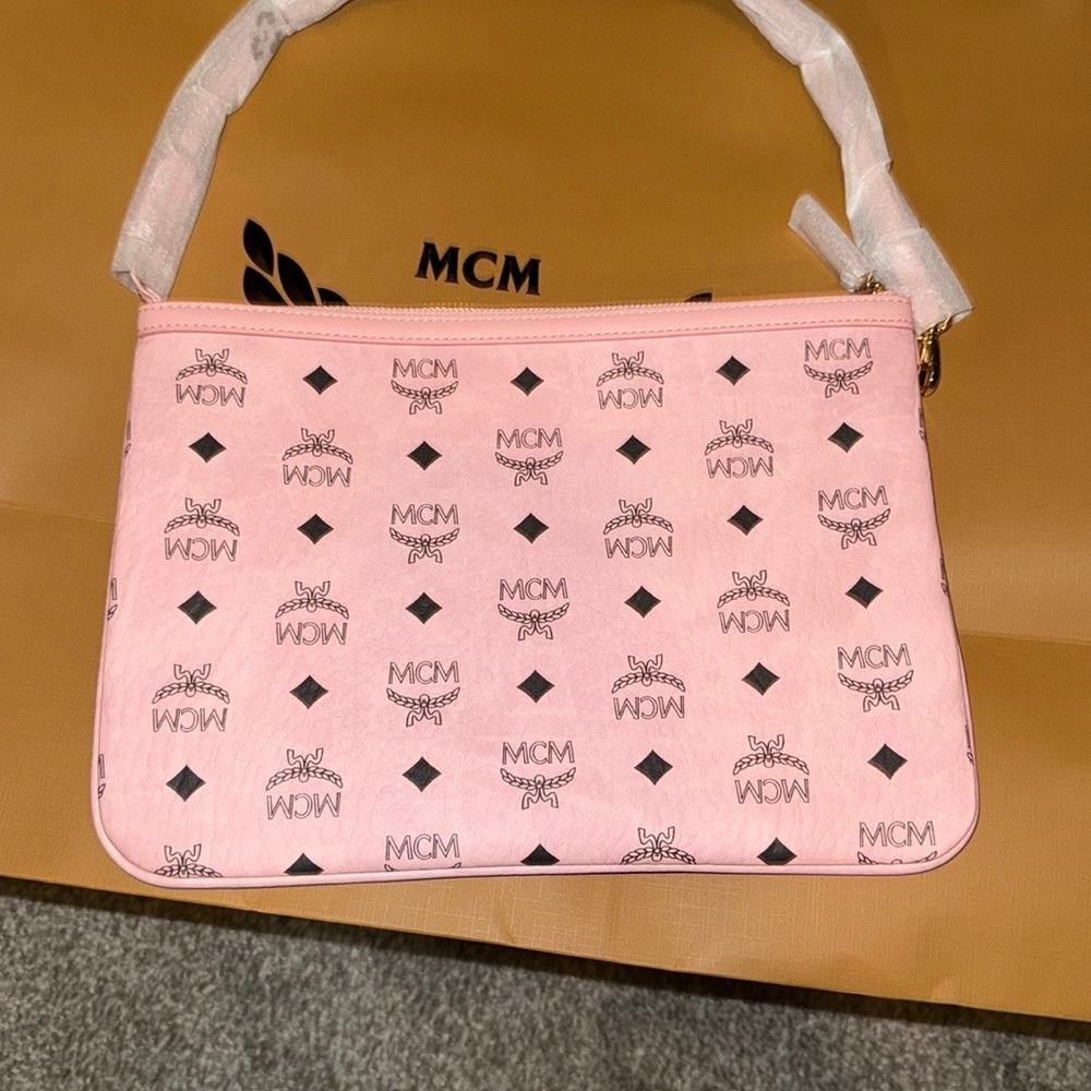 MCM Pink Clutch with Logo Pattern and Wristlet